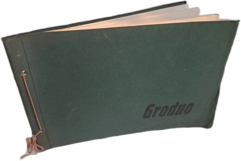 Гродненец купил альбом с фотографиями города, которым исполнилось сто лет