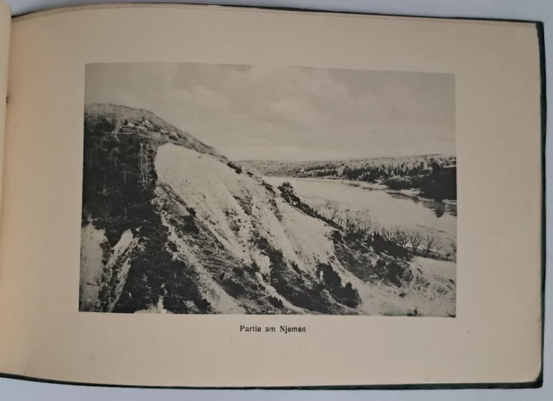 Гродненец купил альбом с фотографиями города, которым исполнилось сто лет