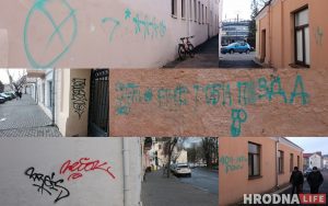 Фотафакт: хтосьці намаляваў на дамах на Замкавай дзіўныя надпісы